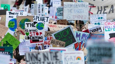 protest signs on climate change