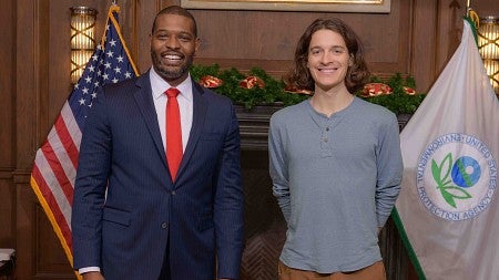 emmett reynier stands with a former EPA director